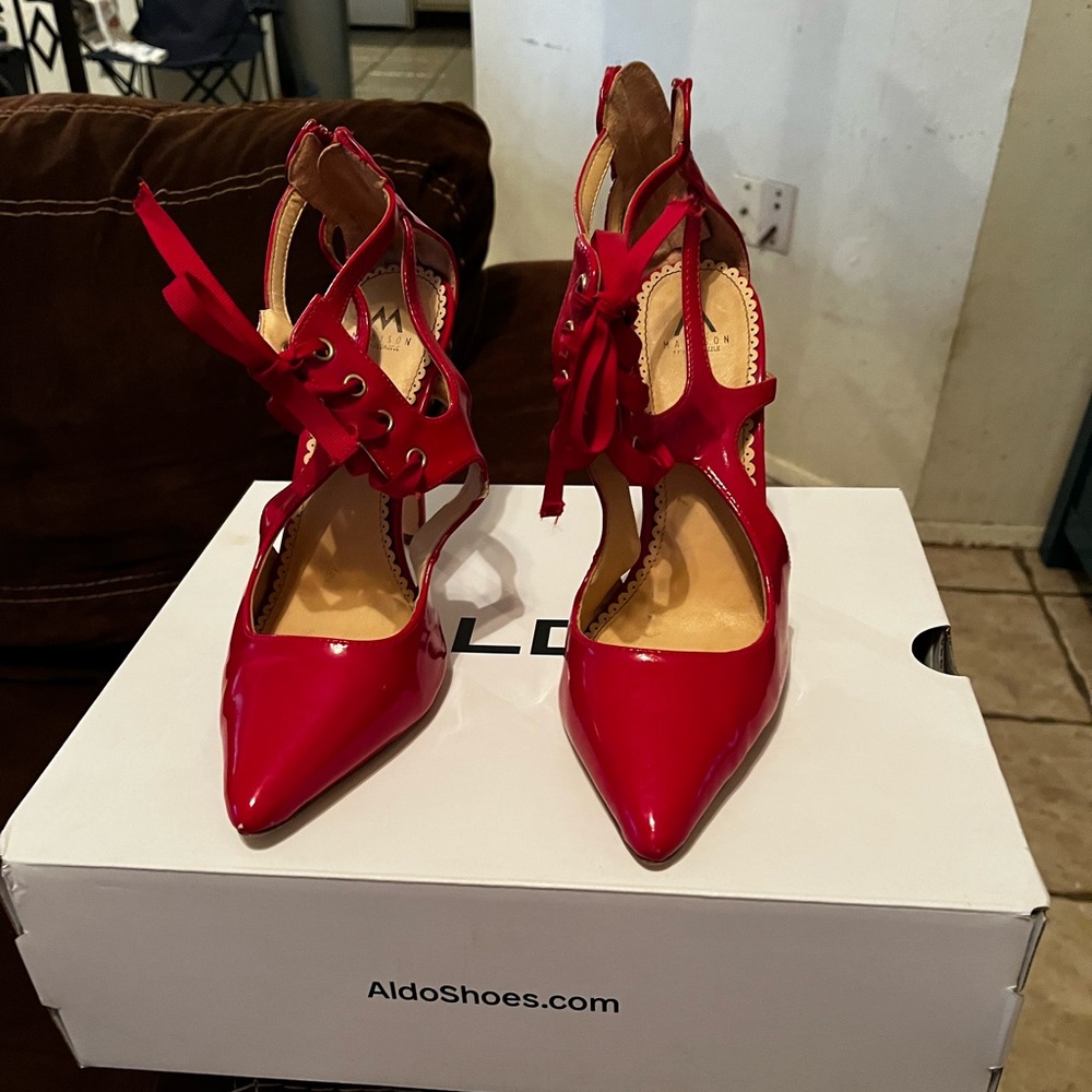 Red sexy heels with lace up in front and zipper in the back